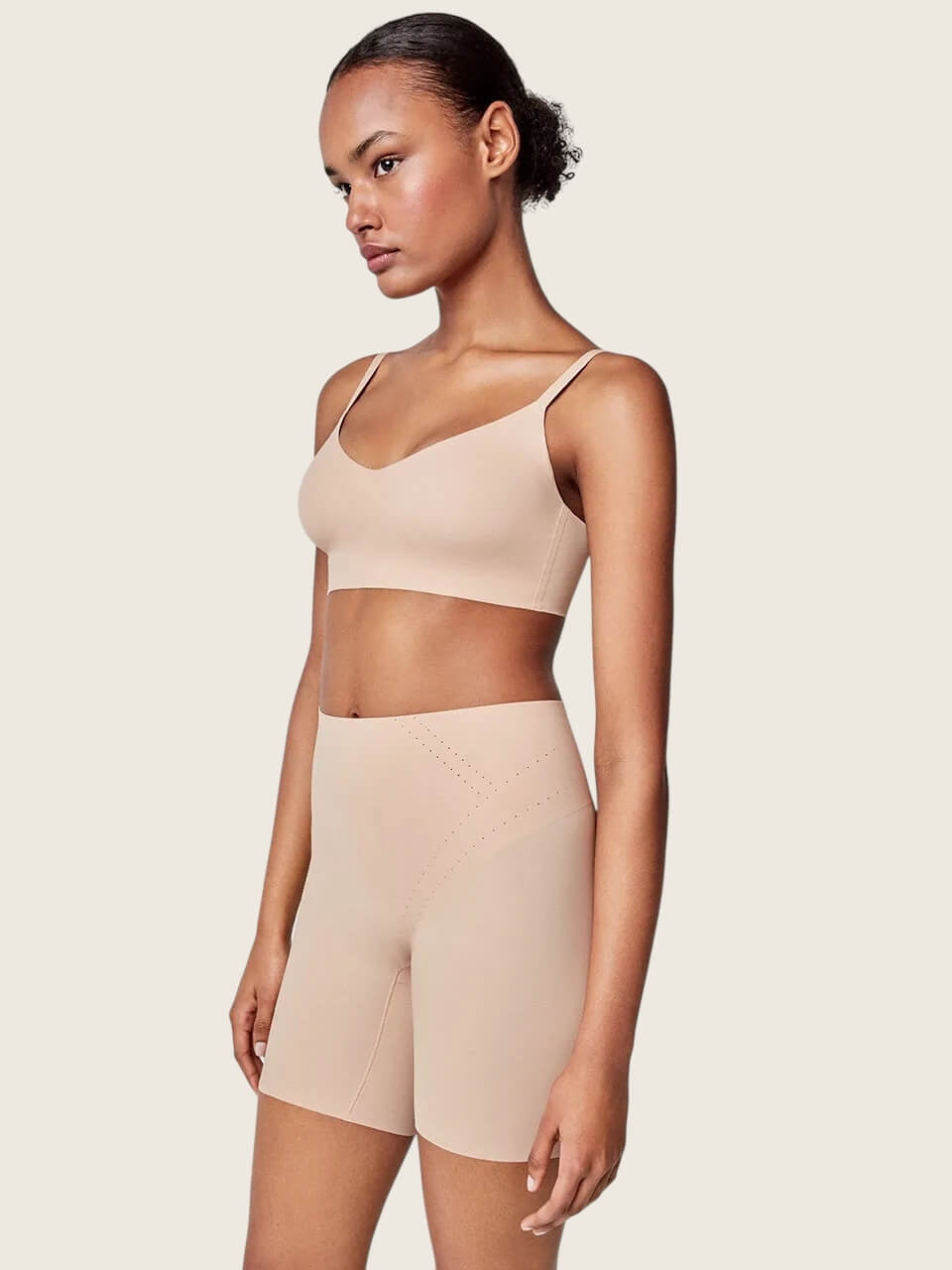 Pantaloni riducenti con rinforzo frontale