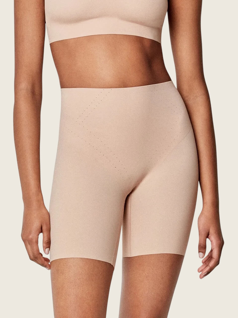Pantaloni riducenti con rinforzo frontale