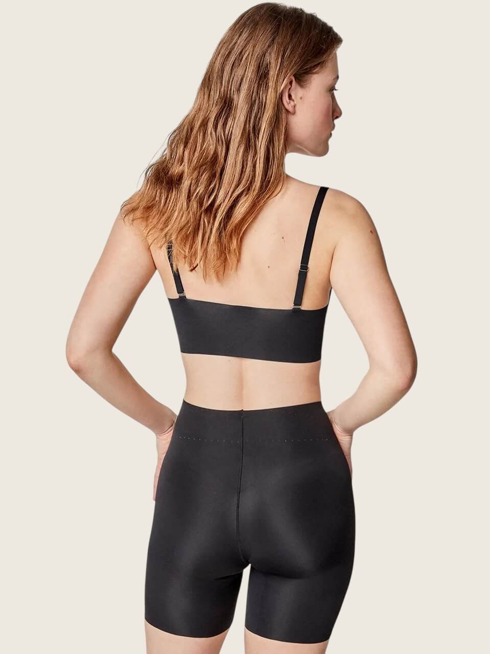 Pantaloni riducenti con rinforzo frontale