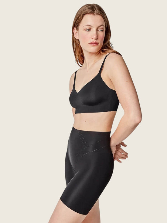 Pantaloni riducenti con rinforzo frontale